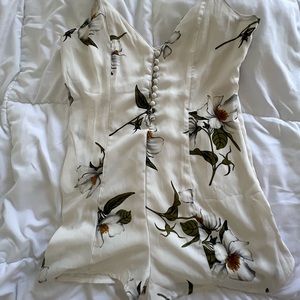 White floral v-neck chiffon lined romper with button details